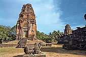 Bakong temple - ancillary towers around the main pyramid with the remains of the nandin bull.